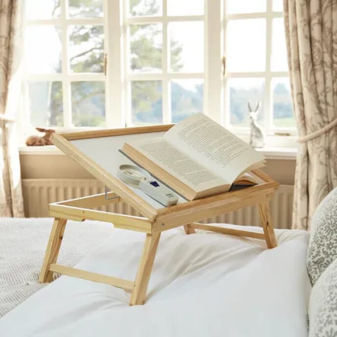 adjustable bed tray table in use