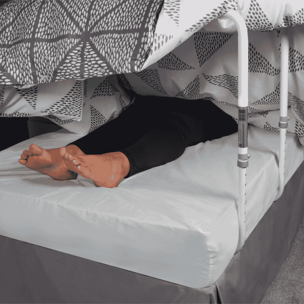 adjustable blanket bed cradle in use
