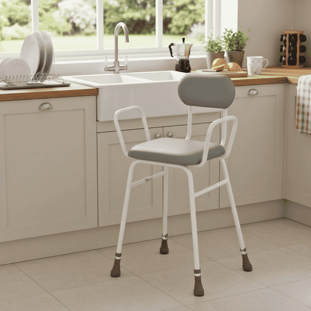 adjustable height perching stool with arms padded back lifestyle
