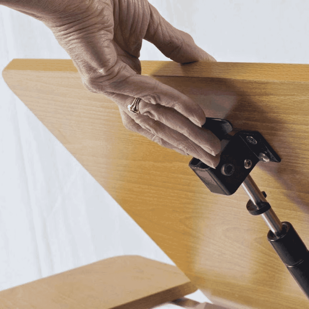 adjustable tilting wheelchair table strut