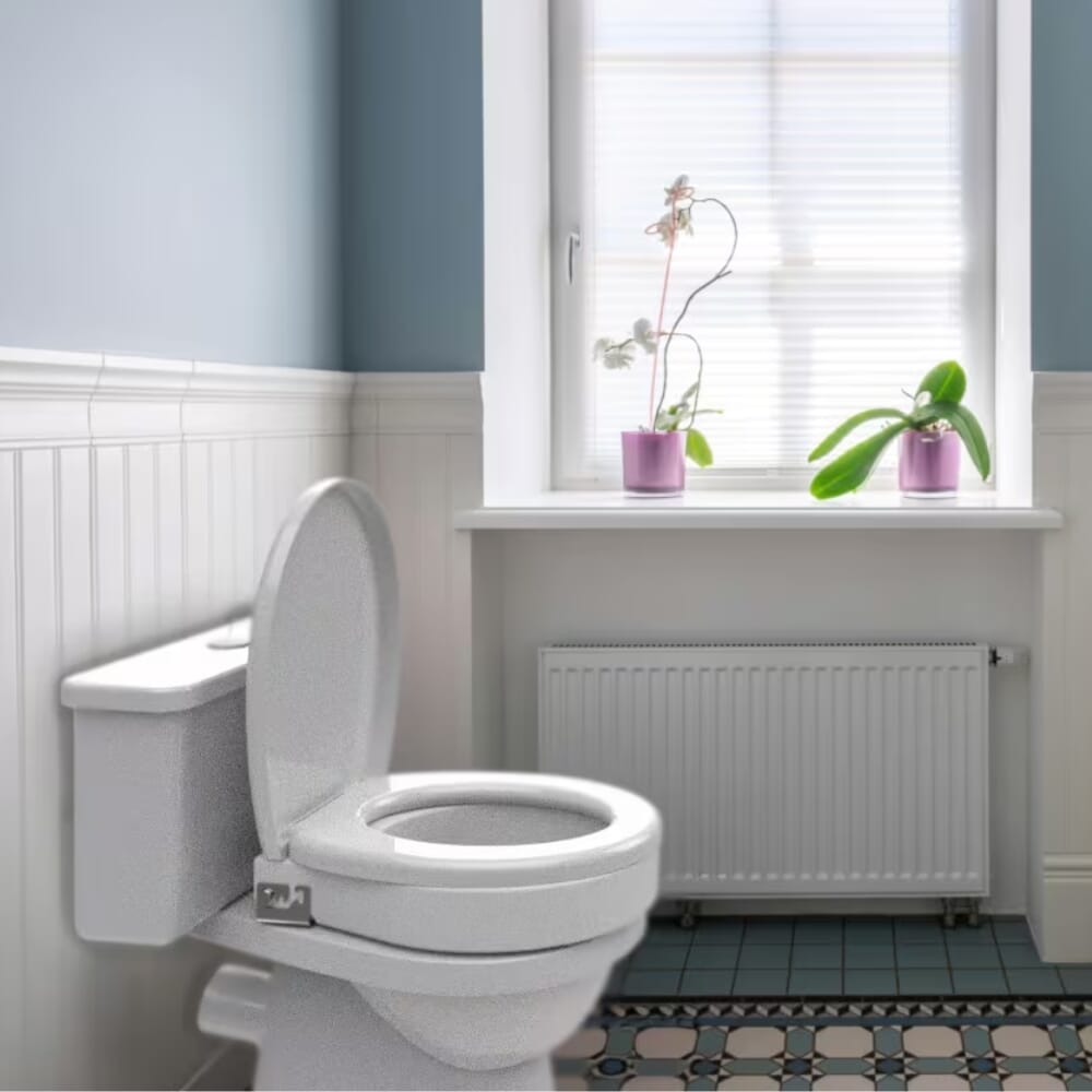 ashby lift oval toilet raiser in bathroom