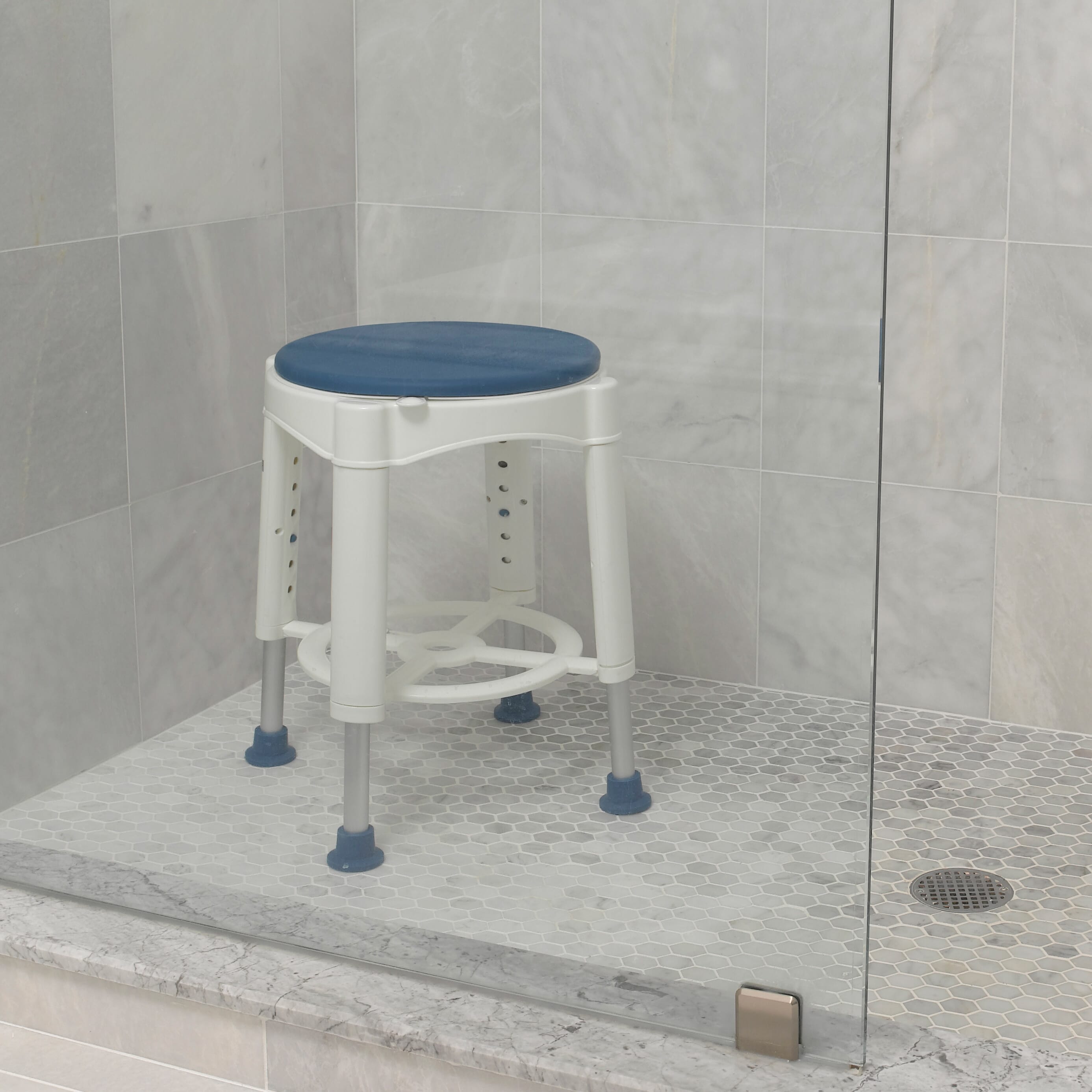 bath stool with rotating padded seat in shower