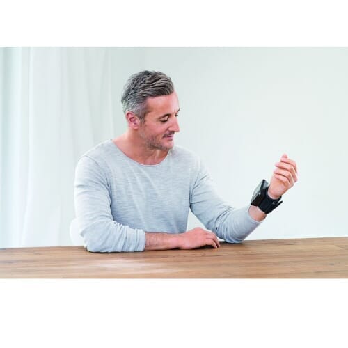 beurer bc 54 bluetooth wrist blood pressure monitor in use