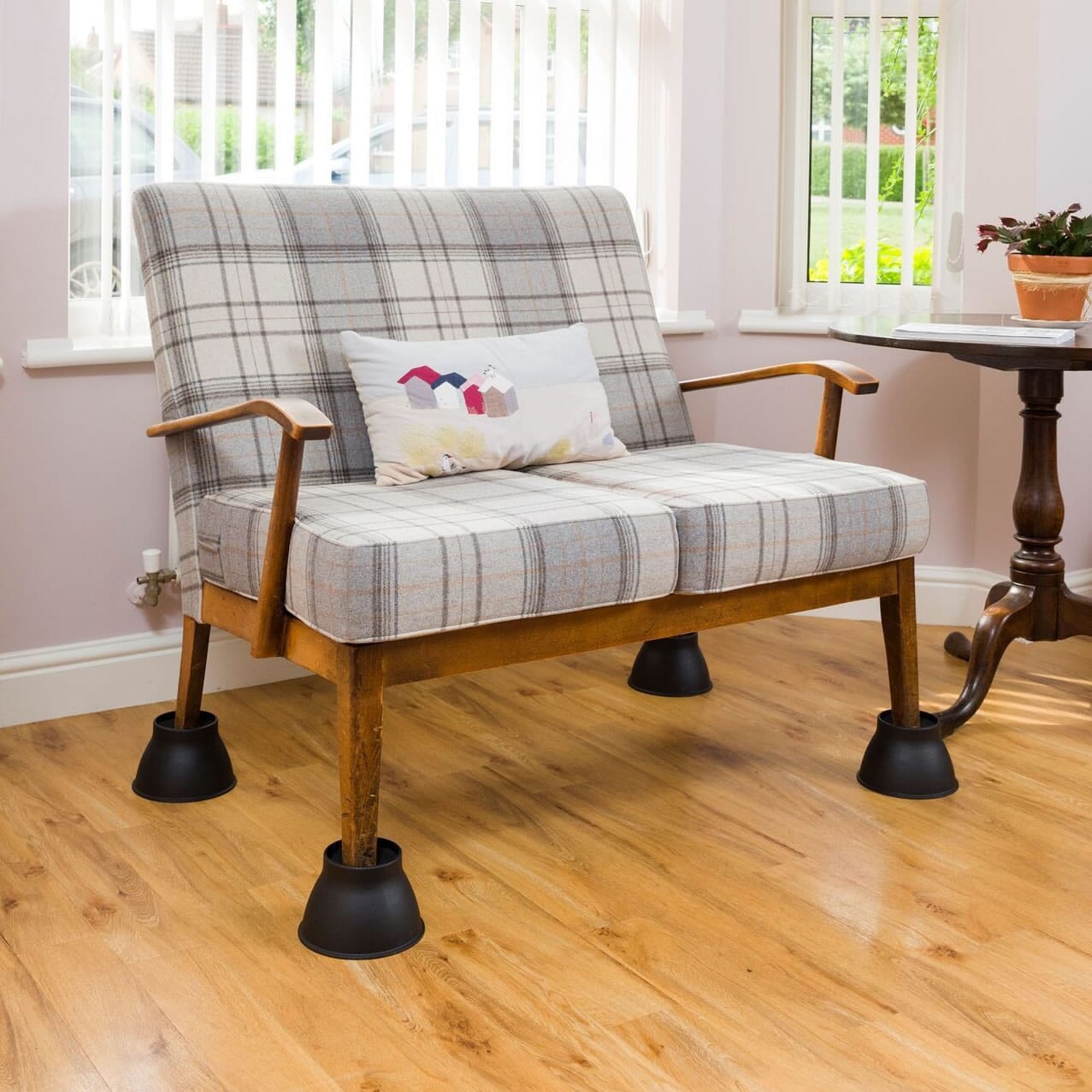 black elephant feet raising sofa