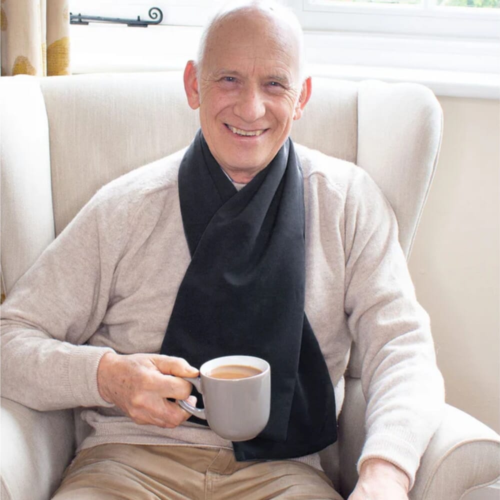 care designs cross scarf clothing protector black in use