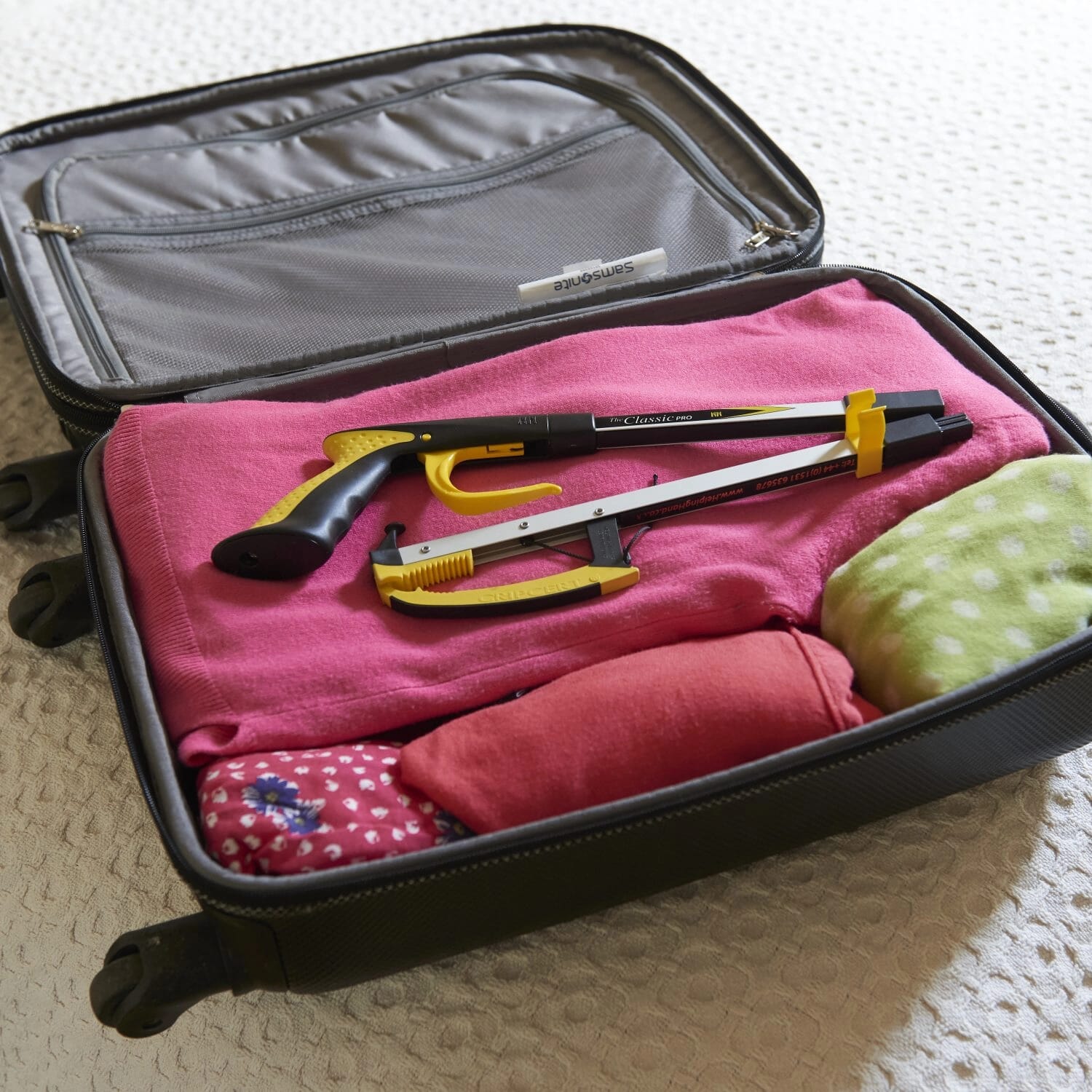 classic pro folding reacher grabber in luggage