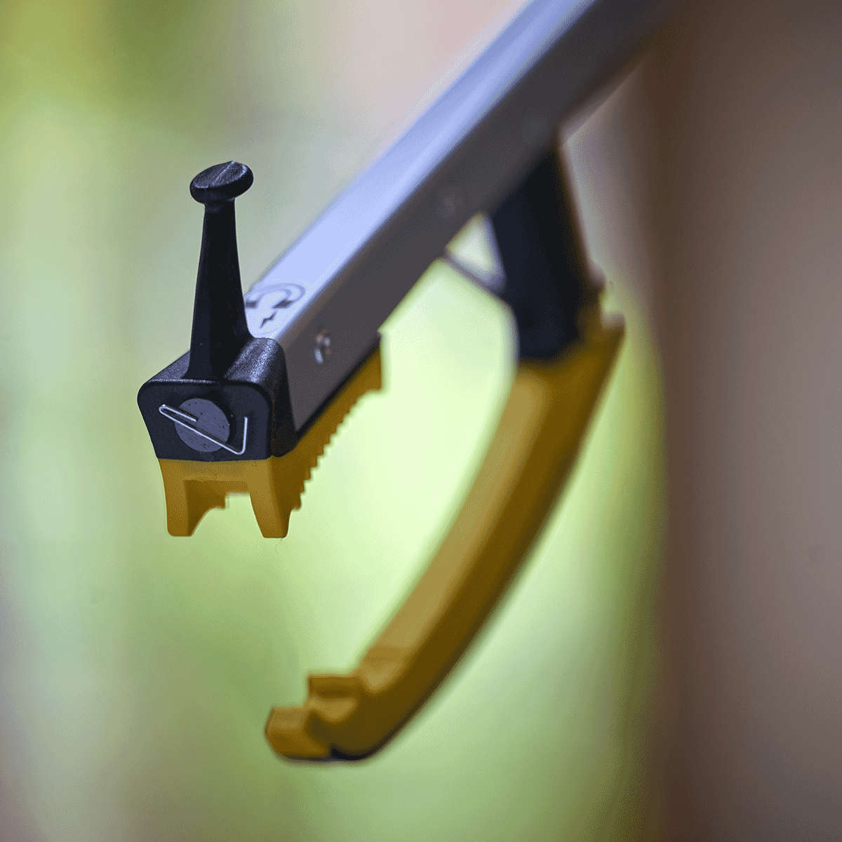 classic pro folding reacher grabber showing tip