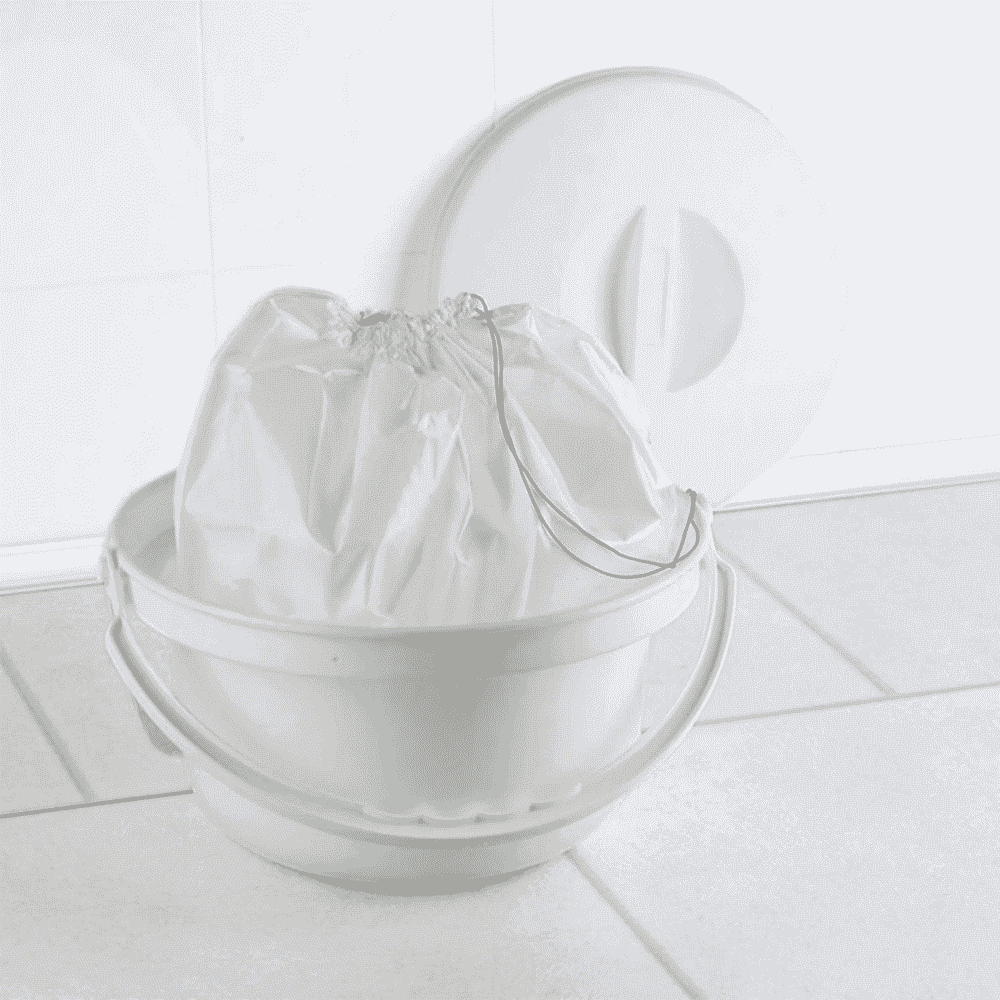 commode pan liner pack of 20 in use