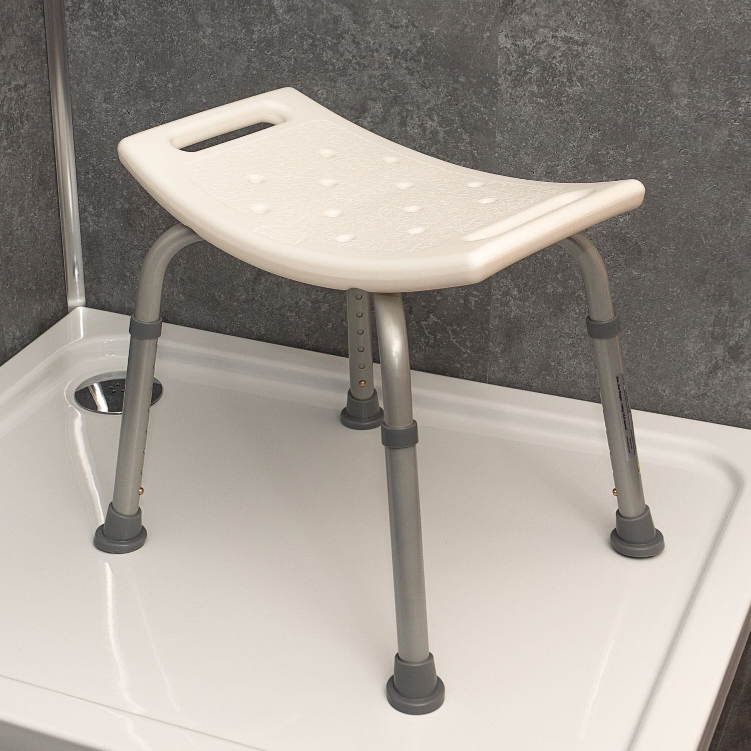 curved shower stool in shower