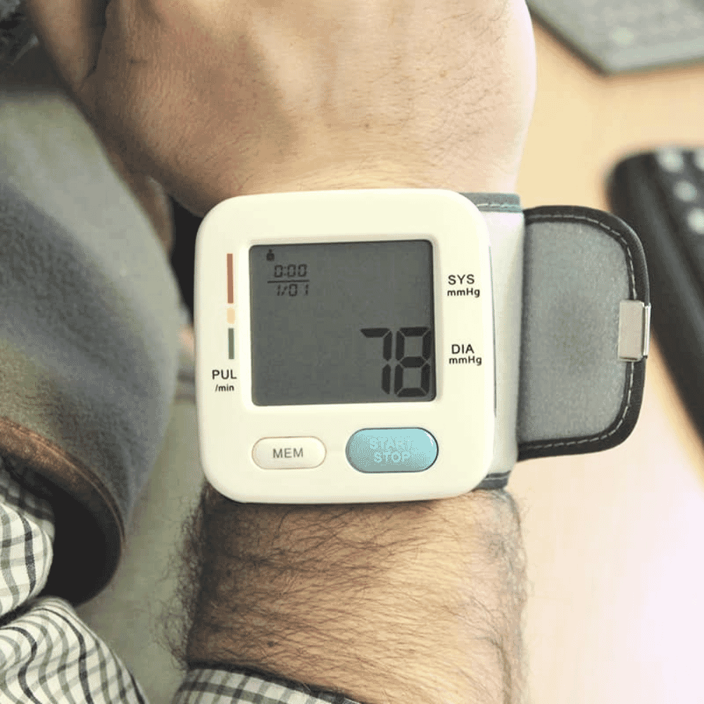digital wrist blood pressure monitor on wrist