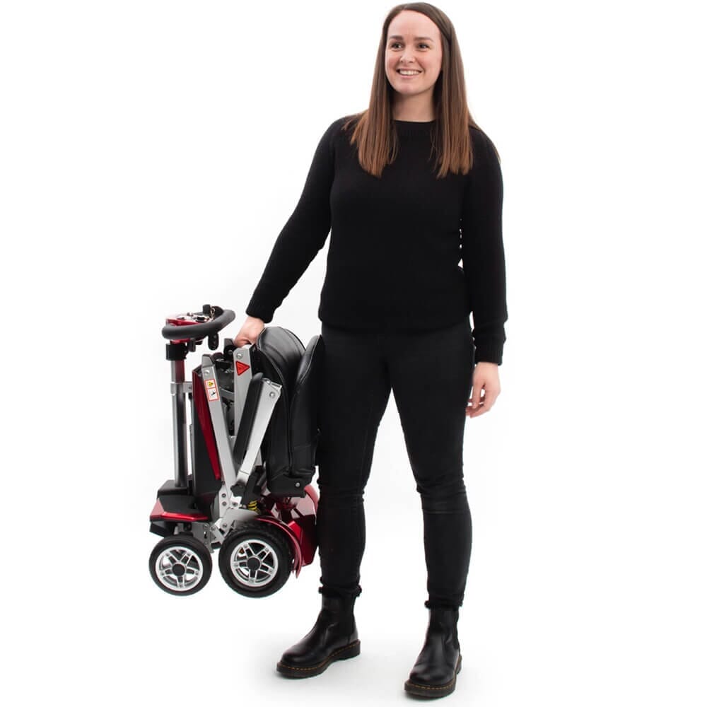 drive autofold elite folding mobility scooter red being carried