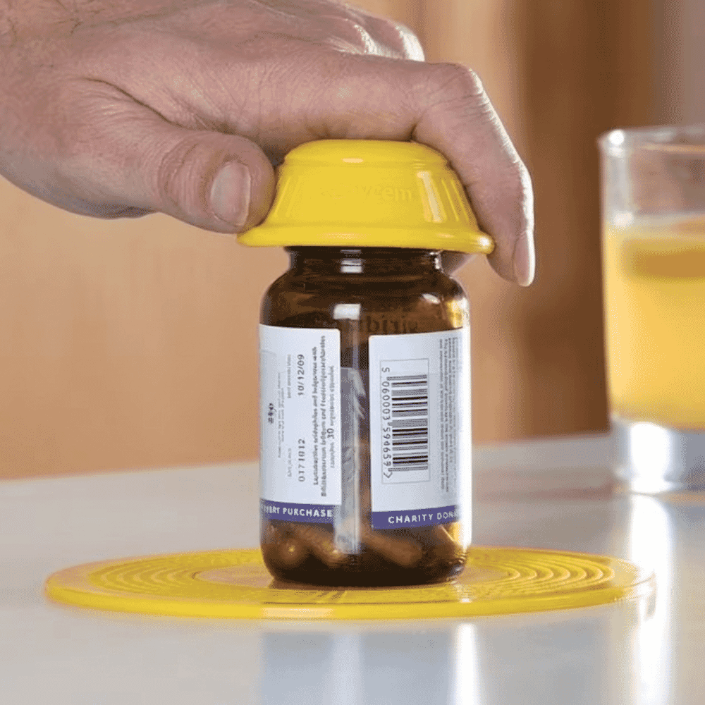 dycem bottle opener yellow in use