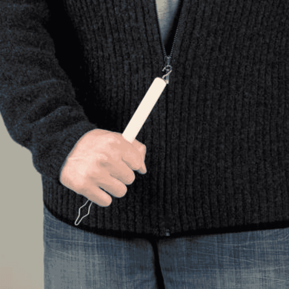 economic button hook and zip puller in use