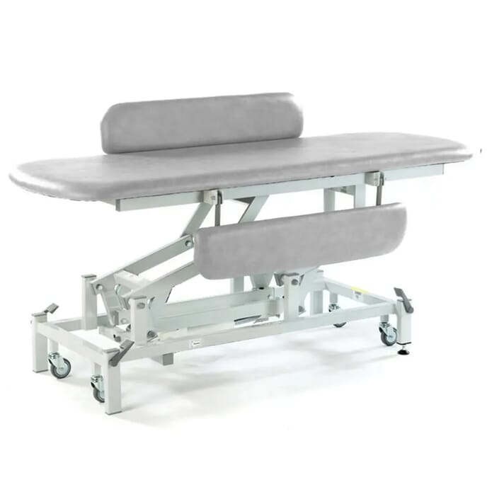 electric changing table with retractable wheels light grey padded