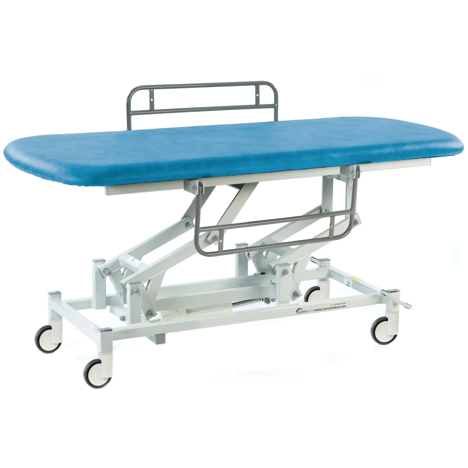 electric therapy hygiene table with central locking wheels and side rails canard