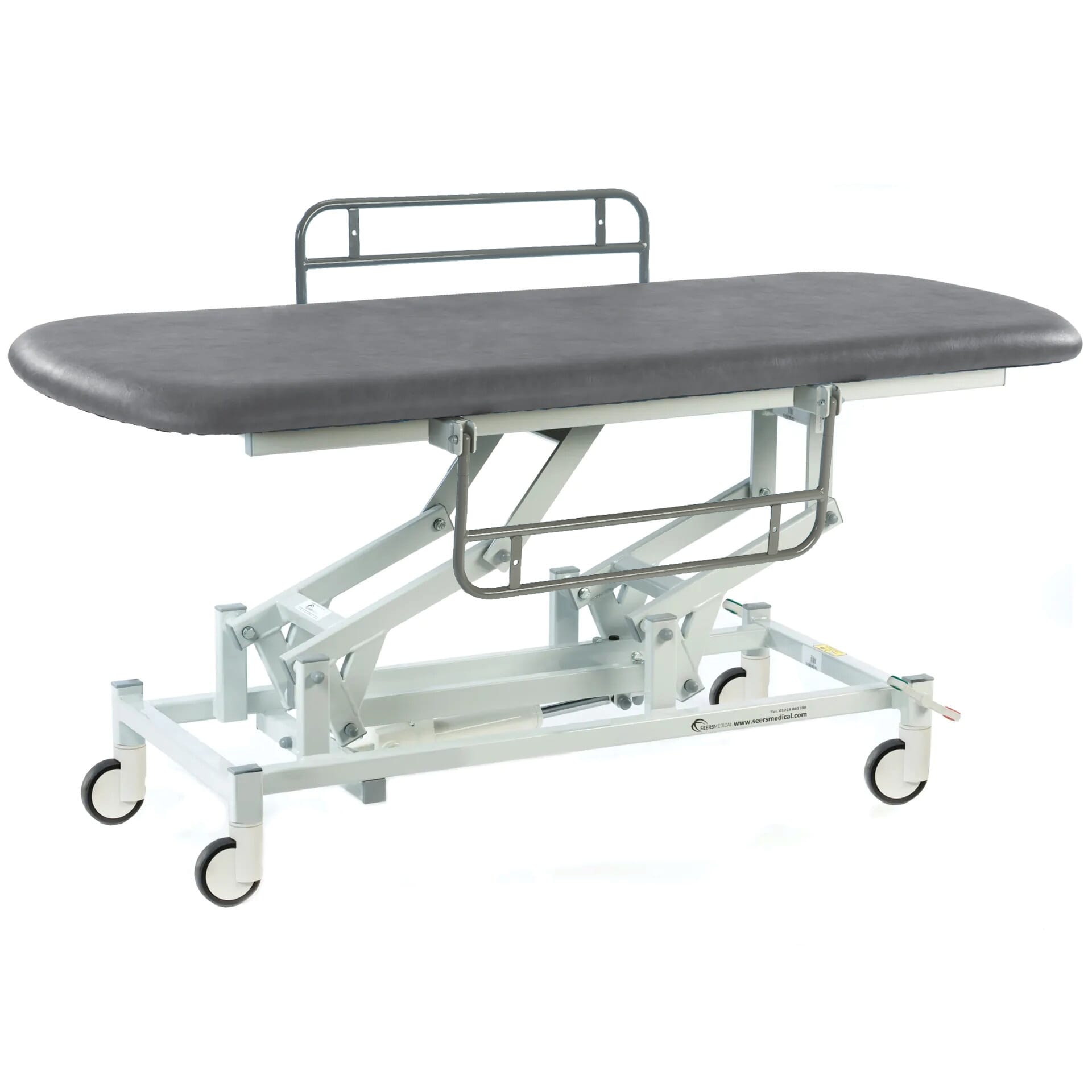 electric therapy hygiene table with central locking wheels and side rails dark grey
