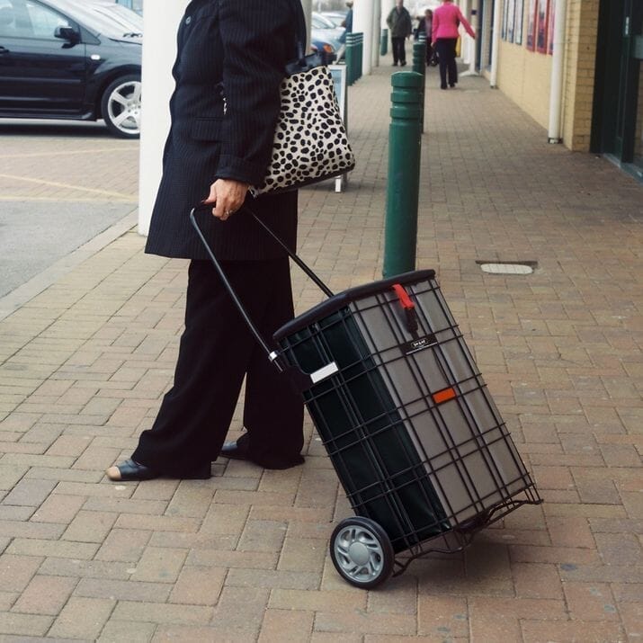 escort shopping trolley in use