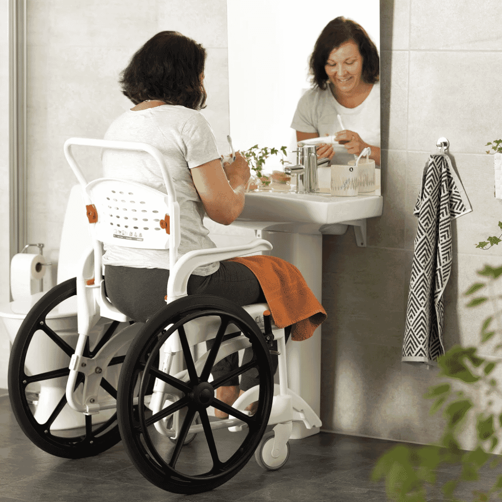 etac clean self propelled shower commode chair lifestyle