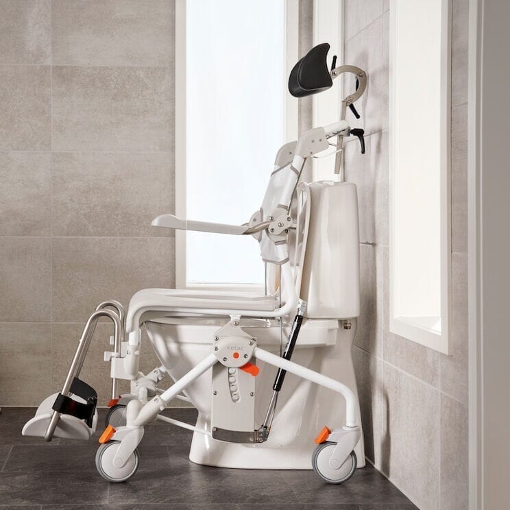 etac swift mobile tilt 2 wheeled shower chair lifestyle