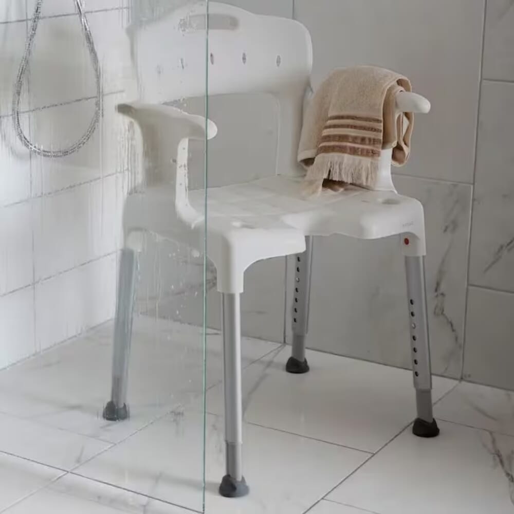 etac swift shower chair with arms grey in shower
