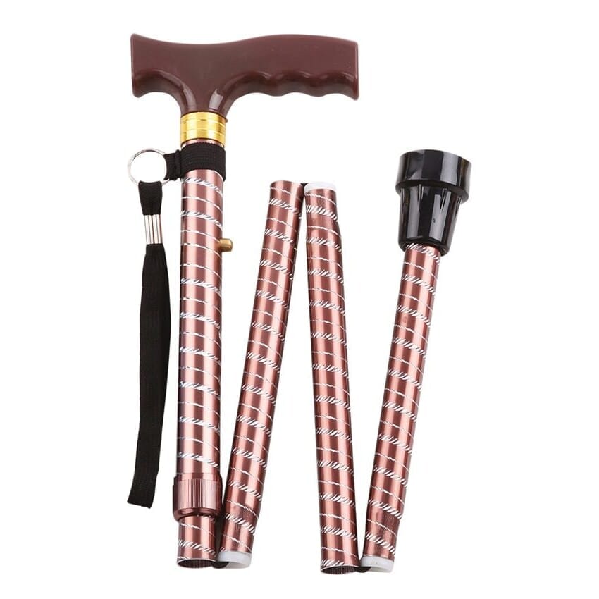 extendable plastic handled walking stick with engraved pattern brown folded