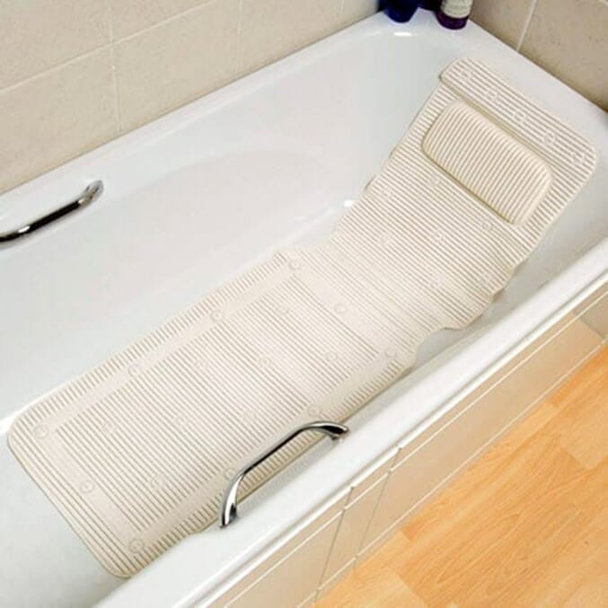 extra long bath mat with pillow in use