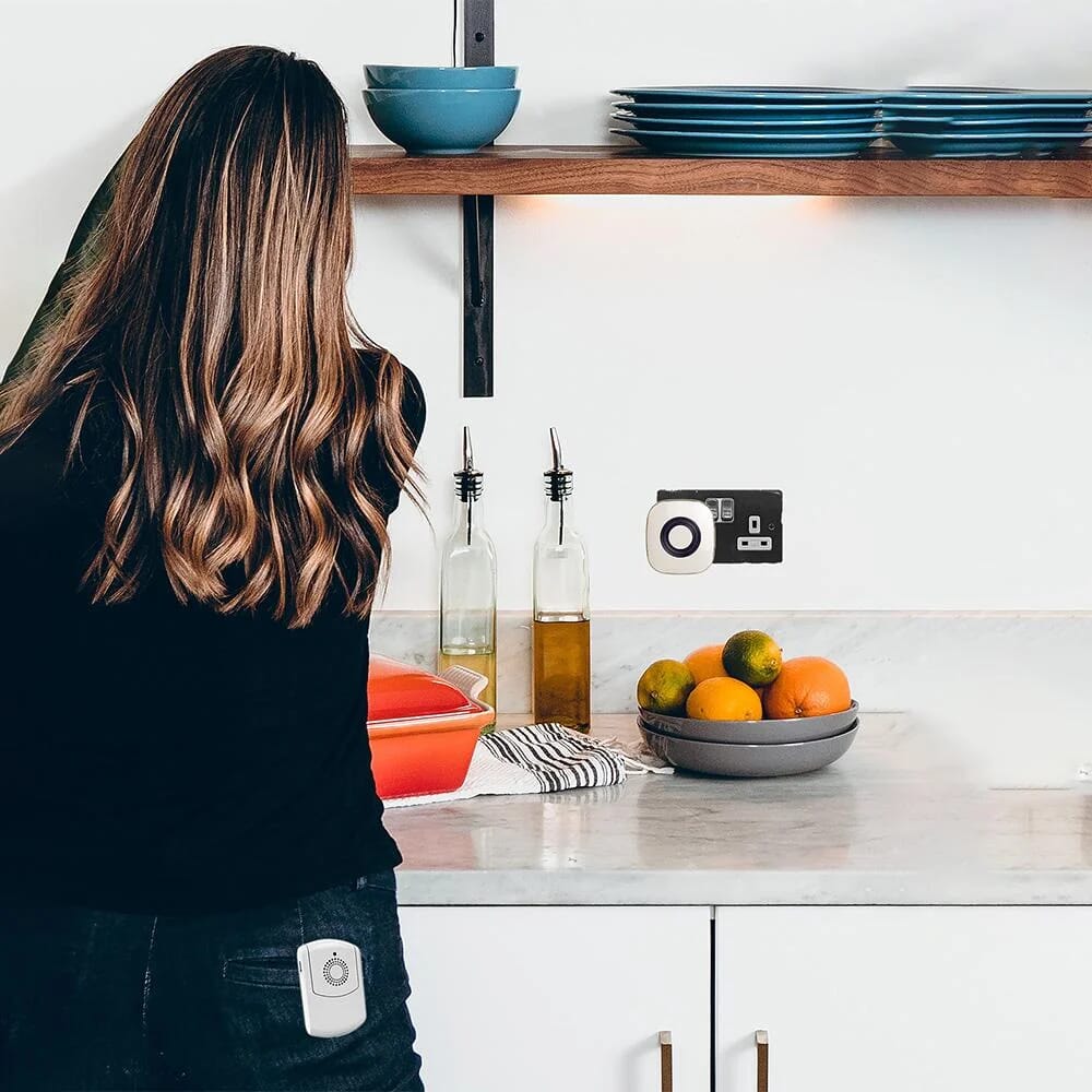 extra loud door chime with flashing light shown with pager in pocket