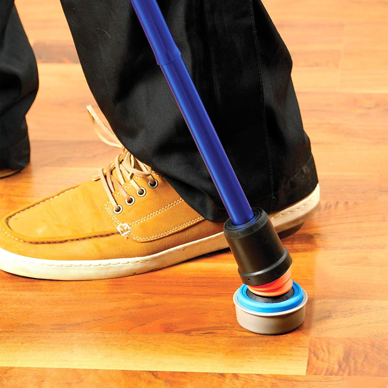 flexyfoot walking stick ice boot cover on wood floor