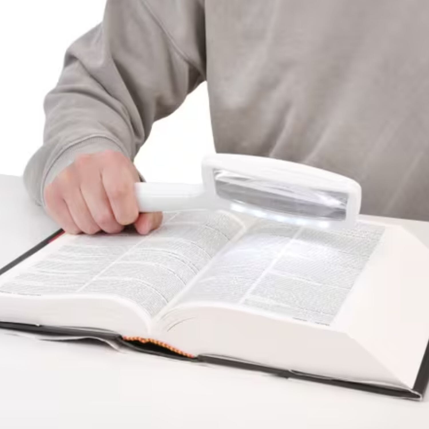 folding led magnifier in use