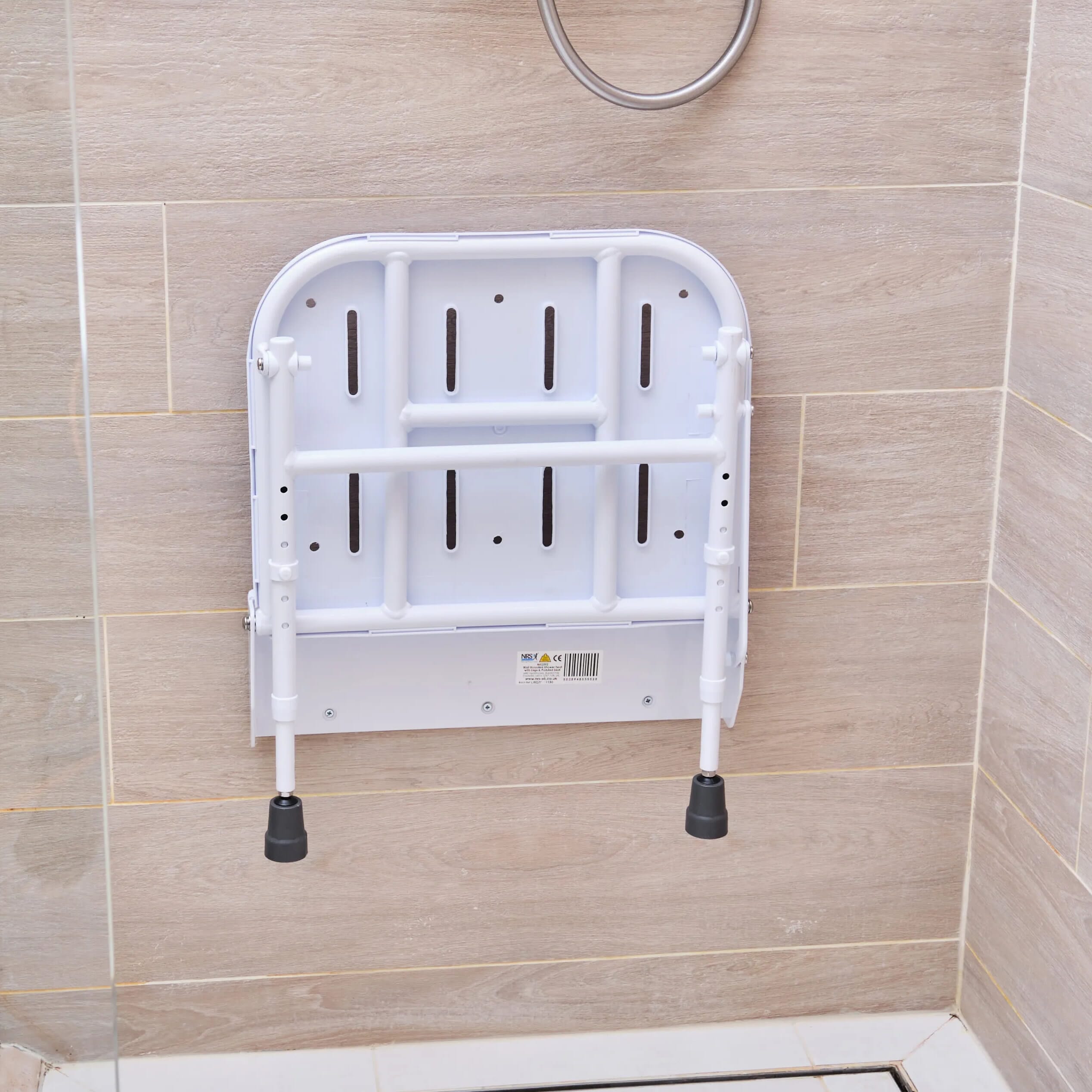 folding shower seat with legs folded up