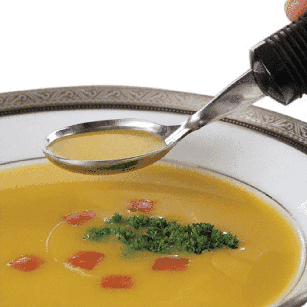 good grips soup spoon in use