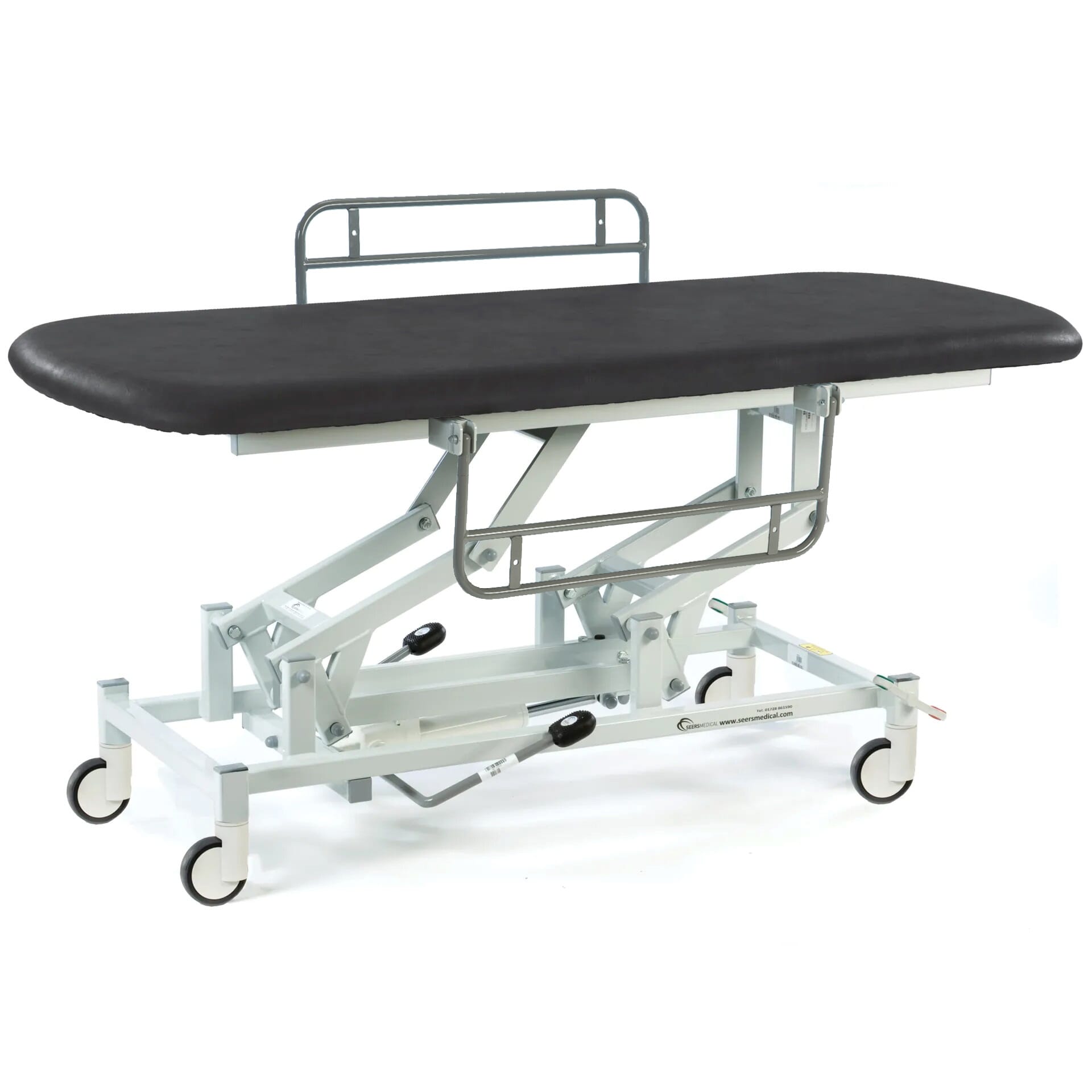 hydraulic therapy hygiene table with central locking wheels and side rails black