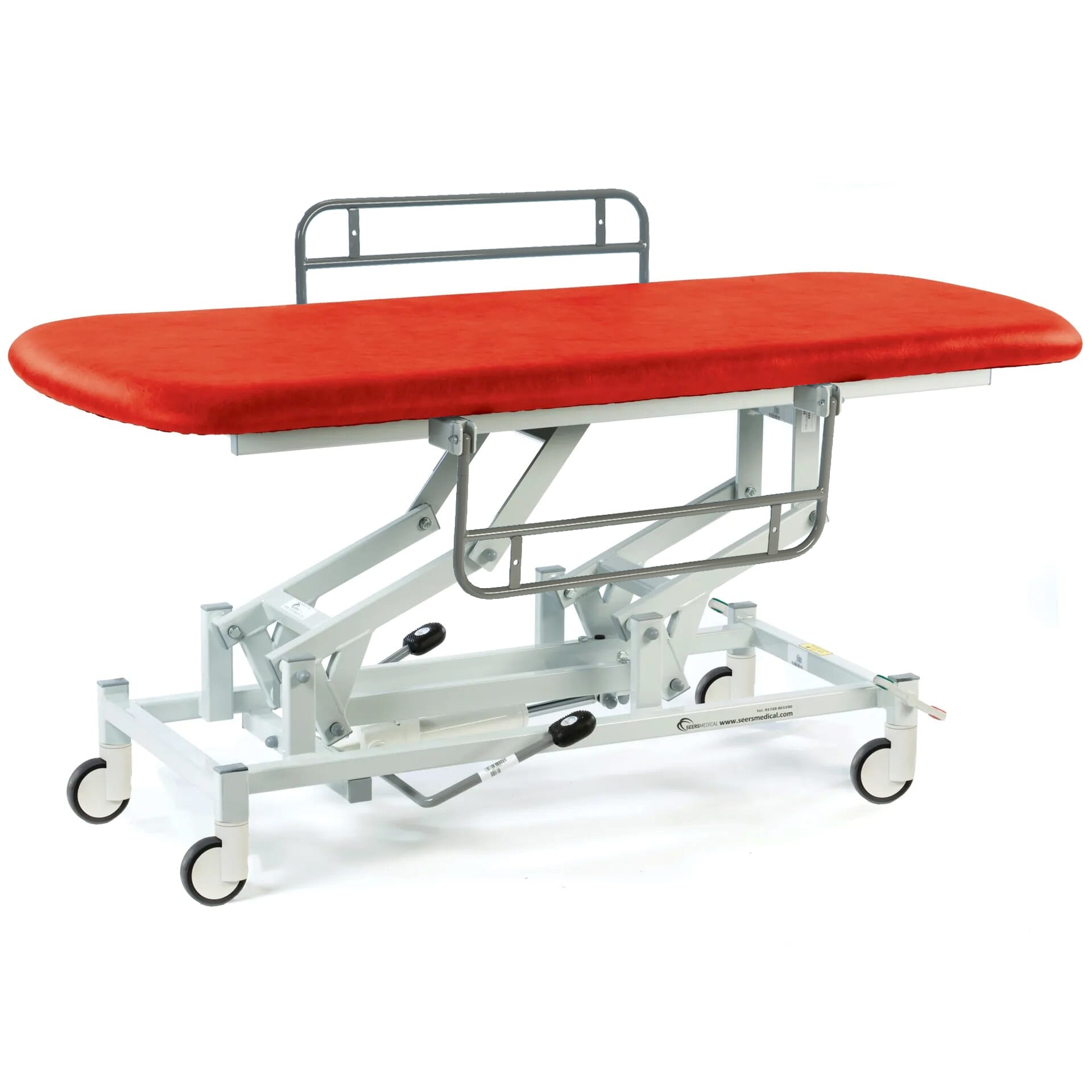 hydraulic therapy hygiene table with central locking wheels and side rails red