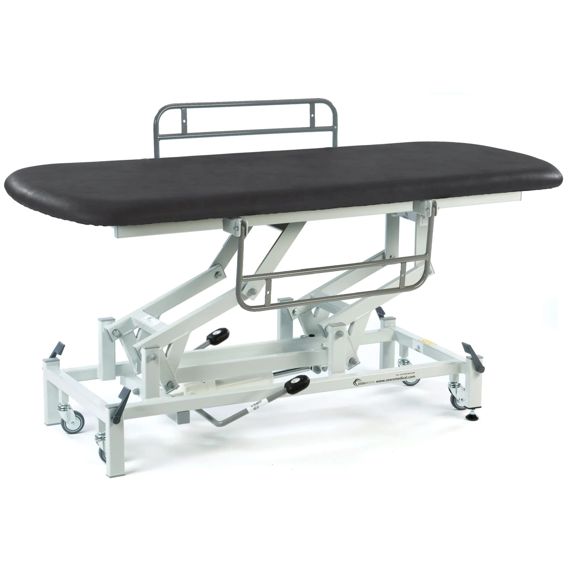 hydraulic therapy hygiene table with retractable wheels and side rails black