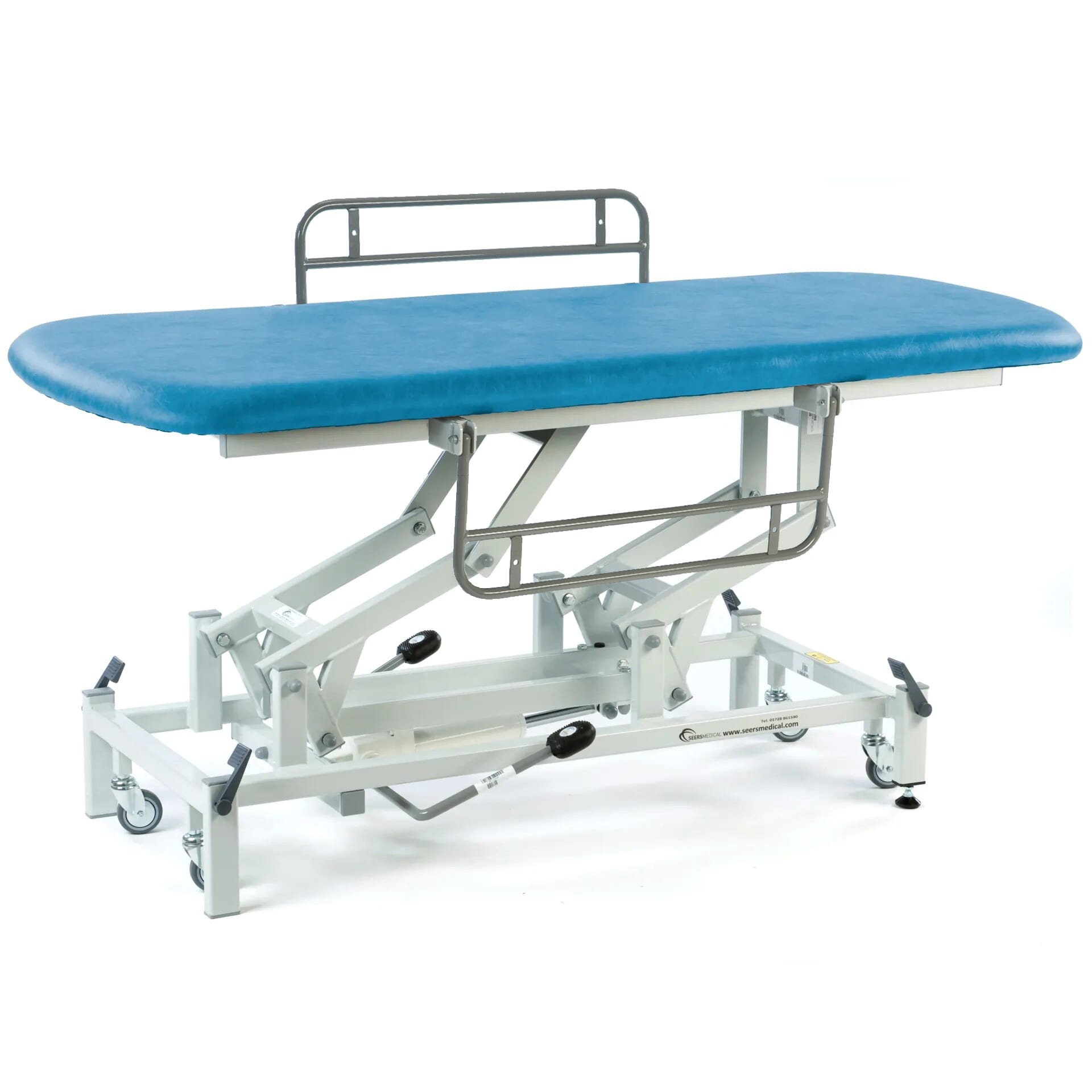 hydraulic therapy hygiene table with retractable wheels and side rails canard