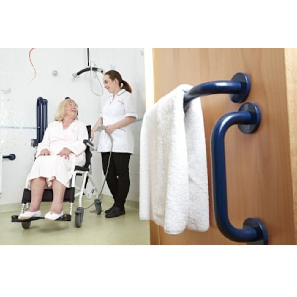 lightweight tilt in space shower commode in use