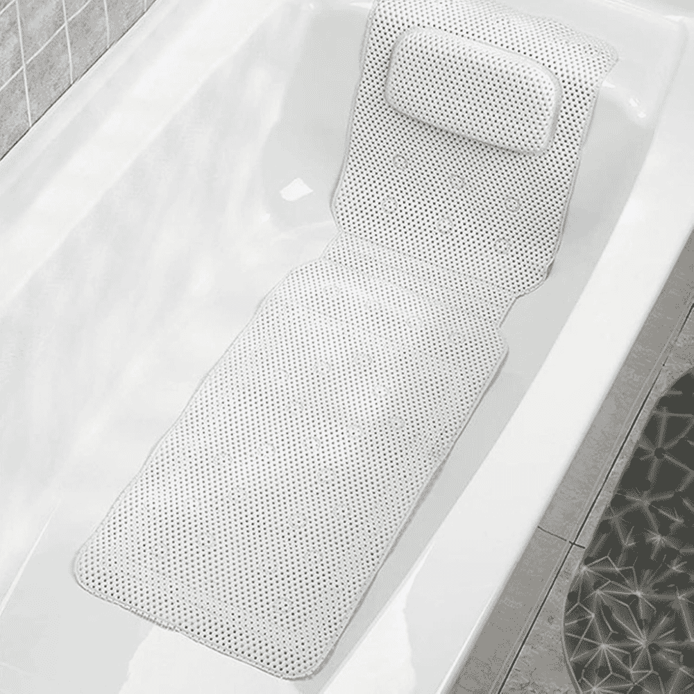 long bath mat with neckrest in bath