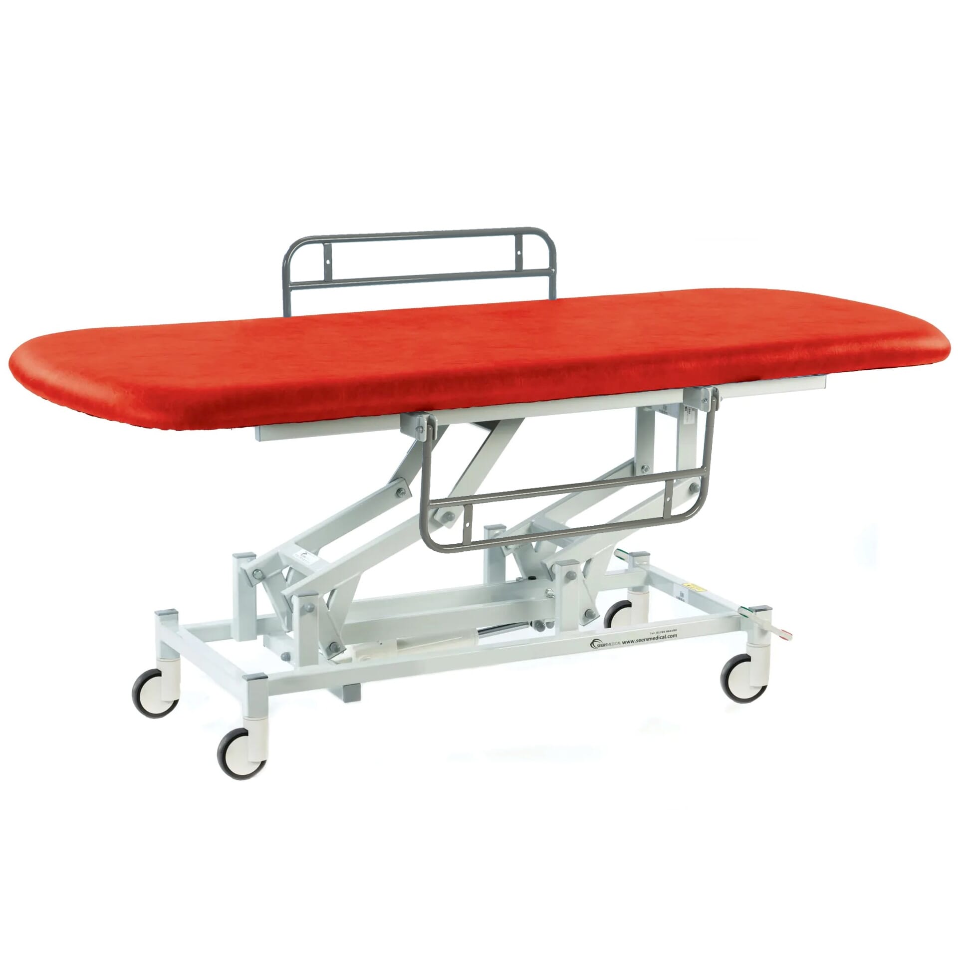 long electric therapy hygiene table with central locking wheels and side rails red