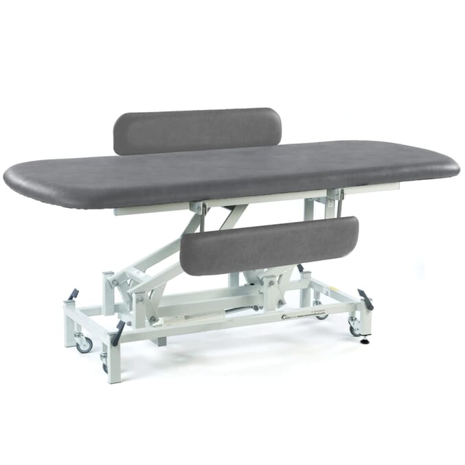 long electric therapy hygiene table with retractable wheels and padded side rails dark grey