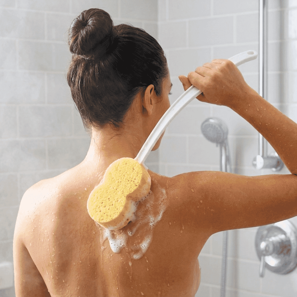 long handled bath sponge in use
