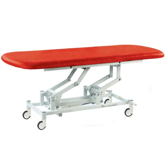 long hydraulic therapy hygiene table with central locking wheels red