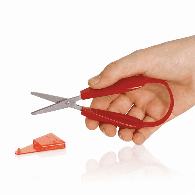 mini easi grip scissors in hand