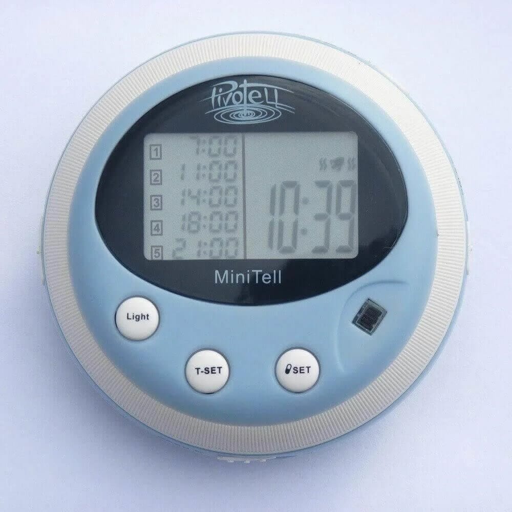 minitell alarmed pocket pill dispenser showing clockface