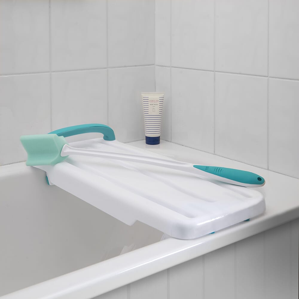 plastic bath board with handle in use