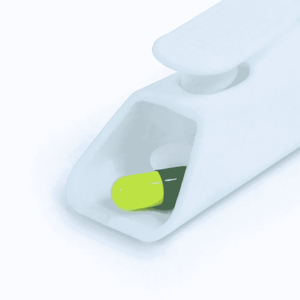 plastic pill popper with tablets