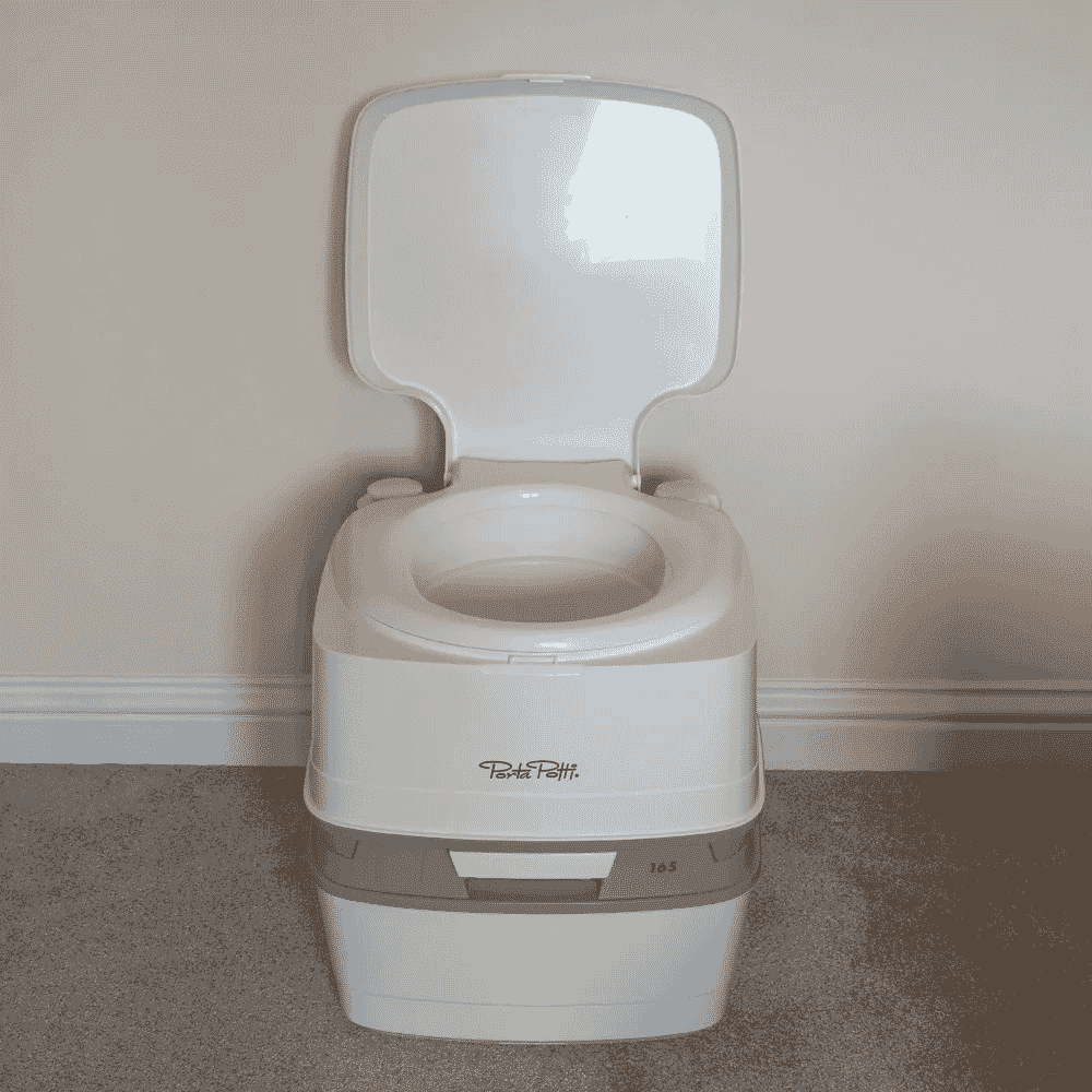 porta potti 165 portable toilet front with lid up