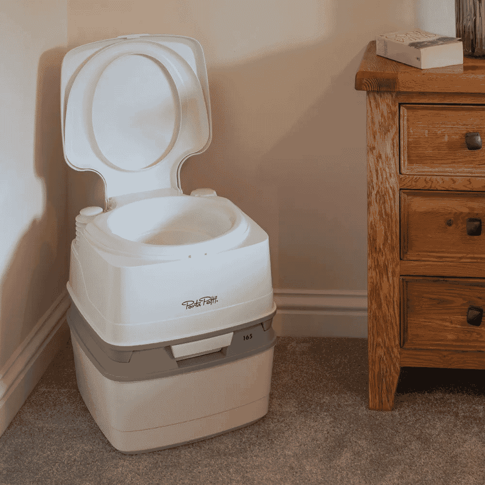 porta potti 165 portable toilet lid up lifestyle