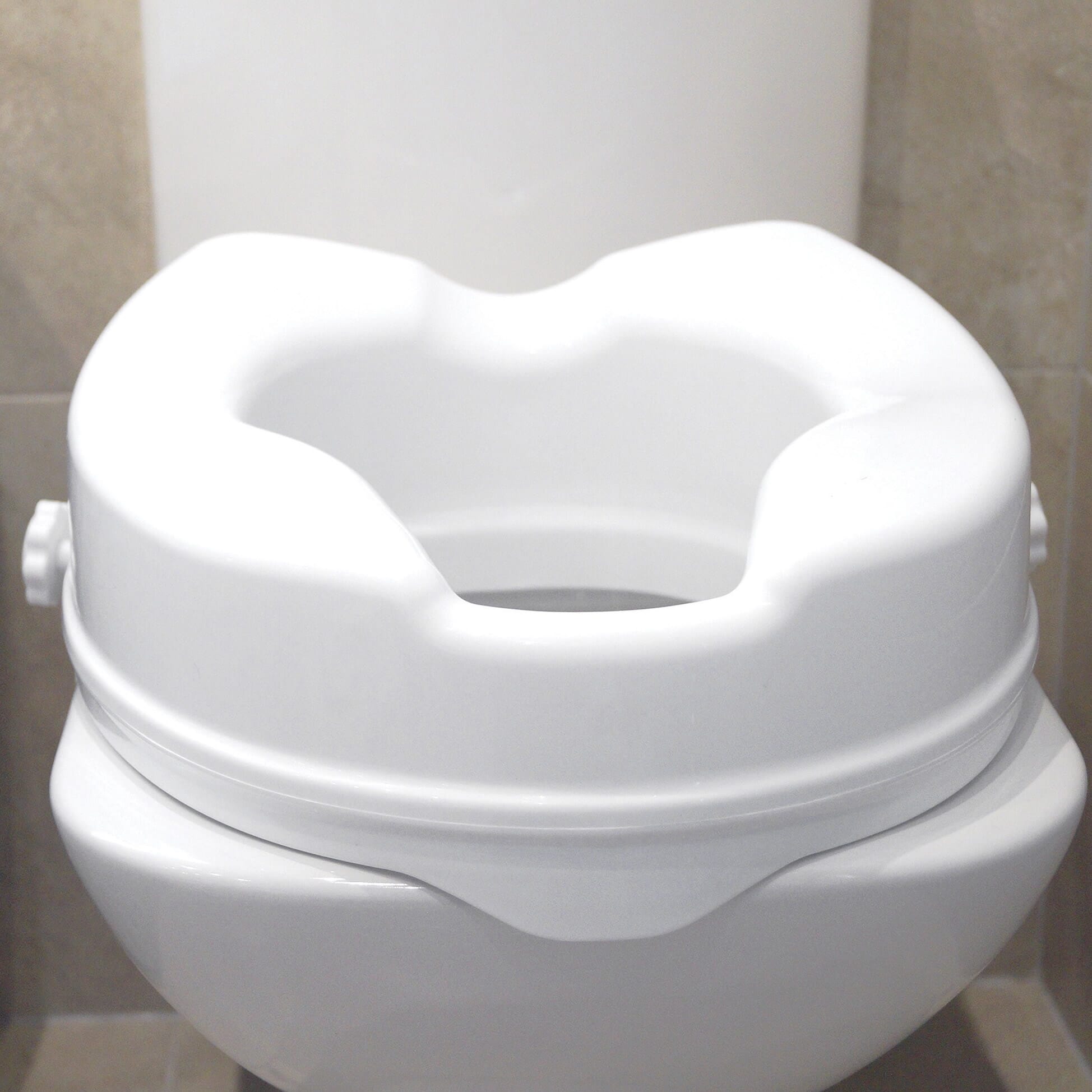 Raised Toilet Seat - 4 inch seat - 2 inch seat from Essential Aids