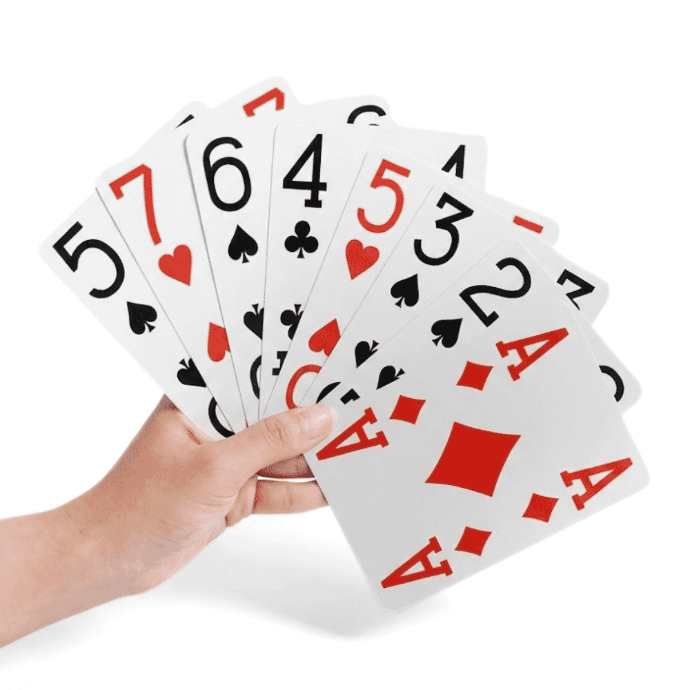 real big playing cards in hand