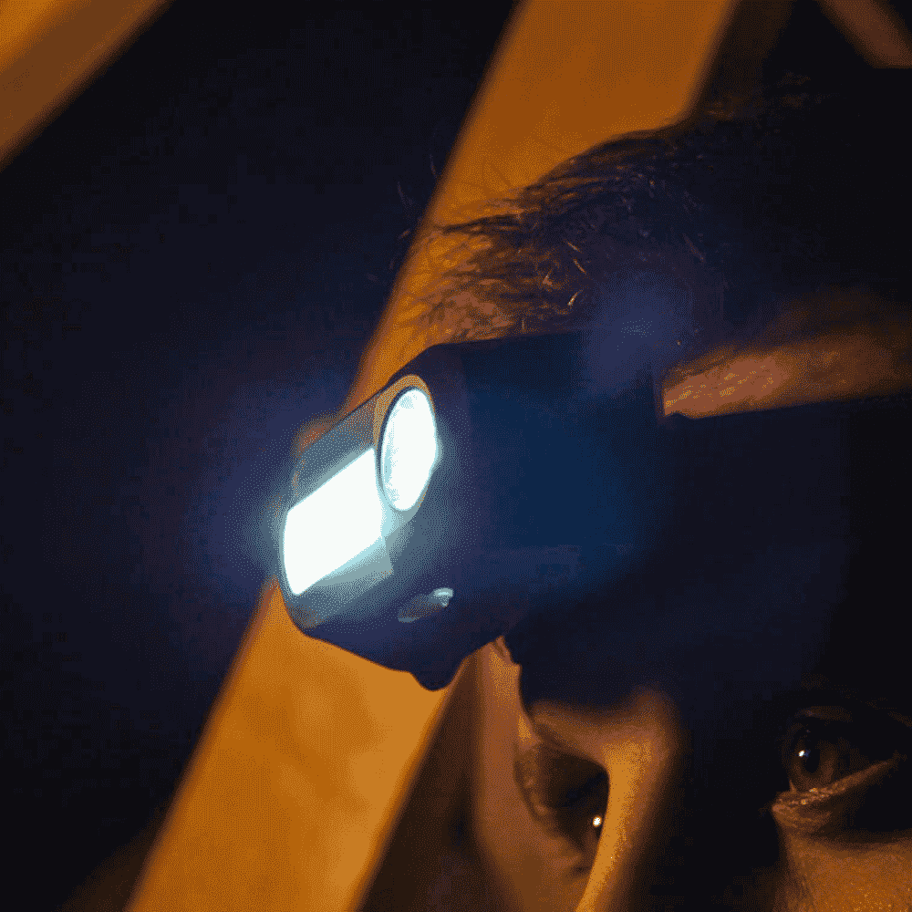 rechargeable head torch in use